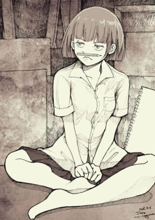 女の子が鉛筆を口に挟む。