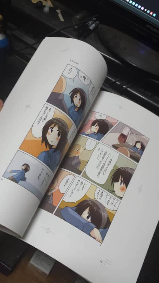 開かれたフルカラー漫画のページ