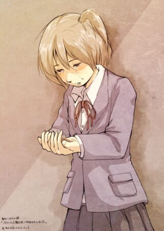 制服姿で涙を流しながら手を握りしめるマキタ