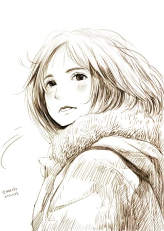 振り返る女性の横顔